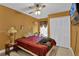 Bedroom with double bed and plenty of closet space at 5232 Deer Creek Dr, Orlando, FL 32821