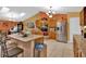 Well-equipped kitchen with an island, stainless steel appliances, and ample counter space at 5232 Deer Creek Dr, Orlando, FL 32821