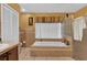 Bathroom with large garden tub and shower at 5232 Deer Creek Dr, Orlando, FL 32821