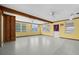 Spacious living area featuring light walls and ceiling fans at 912 Avenue T Se, Winter Haven, FL 33880