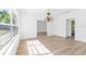 Spacious dining room with hardwood floors and large windows at 751 Avenue B Sw, Winter Haven, FL 33880