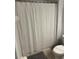 Simple bathroom with a toilet and shower/tub combo at 4734 Vero Beach Pl, Kissimmee, FL 34746