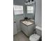 Clean bathroom with a single sink vanity and tiled floors at 4734 Vero Beach Pl, Kissimmee, FL 34746