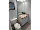 Clean bathroom with a sink, toilet and vanity at 4734 Vero Beach Pl, Kissimmee, FL 34746