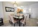 Dining area with table and six chairs, near the kitchen at 4734 Vero Beach Pl, Kissimmee, FL 34746
