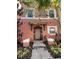 Two-story home with peach-colored exterior and walkway at 4734 Vero Beach Pl, Kissimmee, FL 34746