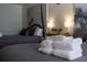 Hotel-style bedroom with two beds, fresh towels, and modern decor at 5245 W Irlo Bronson Memorial Hwy # 160, Kissimmee, FL 34746