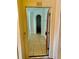 Open door revealing a tiled entryway and interior hallway at 6265 Contessa Dr # 101, Orlando, FL 32829