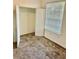Bright bedroom with neutral carpeting and a double door closet at 6265 Contessa Dr # 101, Orlando, FL 32829