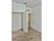 Bedroom with neutral carpeting and double door closets at 6265 Contessa Dr # 101, Orlando, FL 32829