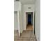 Bedroom with carpet and doors to hallway and closet at 6265 Contessa Dr # 101, Orlando, FL 32829