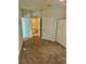 Large main bedroom with carpet and access to bathroom at 6265 Contessa Dr # 101, Orlando, FL 32829