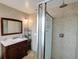 Bathroom with walk-in shower and vanity at 1049 Lake Berkley Dr, Kissimmee, FL 34746