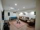 Game room featuring a pool table, comfortable seating, and plenty of space at 1049 Lake Berkley Dr, Kissimmee, FL 34746