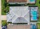 Aerial view showcasing the home's layout and private pool at 1049 Lake Berkley Dr, Kissimmee, FL 34746