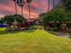 Lake Berkley Resort entrance with lush landscaping and signage at 1049 Lake Berkley Dr, Kissimmee, FL 34746