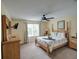 Spacious bedroom with a comfortable bed and plenty of closet space at 1049 Lake Berkley Dr, Kissimmee, FL 34746