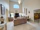 Spacious living room with high ceilings and lots of natural light at 1049 Lake Berkley Dr, Kissimmee, FL 34746
