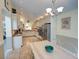 Bright eat-in kitchen, featuring stainless steel appliances and granite countertops at 1049 Lake Berkley Dr, Kissimmee, FL 34746