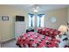 Mickey Mouse themed bedroom with two twin beds at 1049 Lake Berkley Dr, Kissimmee, FL 34746
