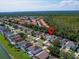 Aerial view of home's location in a quiet residential neighborhood at 1049 Lake Berkley Dr, Kissimmee, FL 34746
