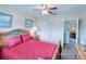 Bedroom with a queen-size bed and ensuite access at 1049 Lake Berkley Dr, Kissimmee, FL 34746