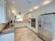 Spacious kitchen with granite countertops and stainless steel appliances at 1049 Lake Berkley Dr, Kissimmee, FL 34746