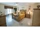 Bright bedroom with large window, ceiling fan and dresser at 1049 Lake Berkley Dr, Kissimmee, FL 34746