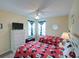 Mickey Mouse themed bedroom with two twin beds at 1049 Lake Berkley Dr, Kissimmee, FL 34746