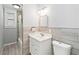 Clean bathroom with updated vanity and tile flooring at 7819 Puritan Rd, Orlando, FL 32807