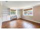 Bright office features built-in shelving and hardwood floors at 7819 Puritan Rd, Orlando, FL 32807