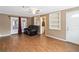 Comfortable living room with access to the backyard and built-in shelving at 7819 Puritan Rd, Orlando, FL 32807