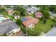 Aerial view showing house, yard, shed, and neighboring homes at 7819 Puritan Rd, Orlando, FL 32807