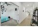 Bright hallway with tile flooring, leading to bedrooms and other areas of the home at 1294 Harbor Ridge Dr, Kissimmee, FL 34759