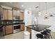 Kitchen features stainless steel appliances and a large kitchen island at 1294 Harbor Ridge Dr, Kissimmee, FL 34759