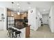Modern kitchen with stainless steel appliances and an island with seating at 1294 Harbor Ridge Dr, Kissimmee, FL 34759