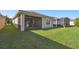 Spacious backyard with screened patio at 1294 Harbor Ridge Dr, Kissimmee, FL 34759
