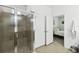 Bathroom with walk-in shower, additional door to bedroom, and access to a bedroom at 1294 Harbor Ridge Dr, Kissimmee, FL 34759