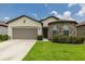 Two-story house with stone accents at 794 Citrus Isle Dr, Davenport, FL 33837