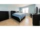 Bright bedroom with a king-size bed at 794 Citrus Isle Dr, Davenport, FL 33837