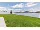 Spacious backyard with grassy lawn and white vinyl fence at 794 Citrus Isle Dr, Davenport, FL 33837