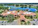Aerial view of clubhouse and lake at 341 Navarra Ln, Davenport, FL 33837