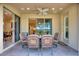 Relaxing outdoor patio with seating area, ideal for enjoying the Florida weather at 341 Navarra Ln, Davenport, FL 33837