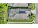 Top-down view of the house, showcasing the roof and solar panels at 341 Navarra Ln, Davenport, FL 33837
