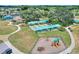 Aerial view of bocce ball courts, playground, and more at 341 Navarra Ln, Davenport, FL 33837
