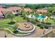 Resort-style community pool, clubhouse, and fire pit at 341 Navarra Ln, Davenport, FL 33837