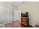 Spacious bedroom with hardwood floors and neutral walls at 341 Navarra Ln, Davenport, FL 33837