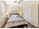 Comfortable bedroom with a queen-size bed and plenty of natural light at 341 Navarra Ln, Davenport, FL 33837