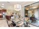 Breakfast nook with glass table and chairs, perfect for enjoying morning meals at 341 Navarra Ln, Davenport, FL 33837