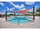 Relaxing pool with shaded seating at 341 Navarra Ln, Davenport, FL 33837